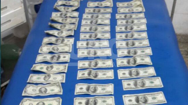 Robaron, trataron de escapar tirándose al río pero los detuvieron con un botín de 5.000 dólares