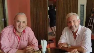 Miguel Rettore junto al gobernador Rogelio Frigerio