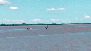 Buscan a dos hermanos que desaparecieron en el río cuando pescaban