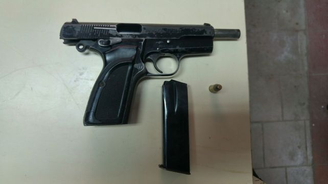 Arma. La pistola 9 milímetros.&nbsp;