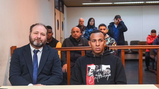 Sebastián Villa y su abogado Martín Apolo
