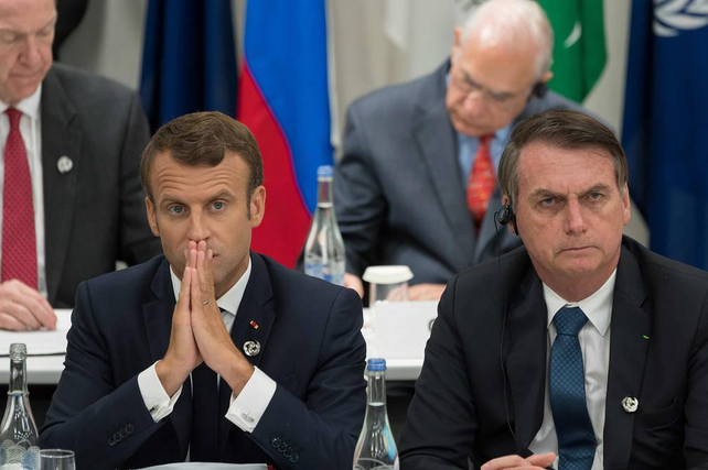 Mala onda. El presidente Macron no se habla ni le dirige la mirada a Bolsonaro en Roma