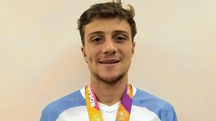 Franco Rossetto, con la medalla en rugby.