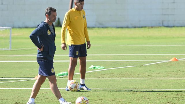 DT y jugador. Cocca junto a Molina
