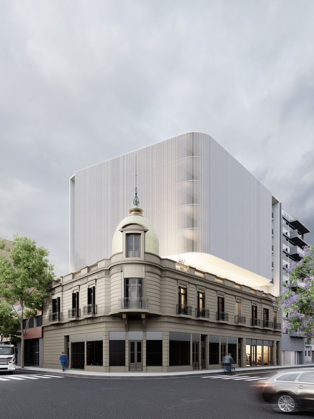 El diseño cuida especialmente uno de los rasgos más reconocibles del edificio: la cúpula de la esquina. La nueva construcción se aleja de ese punto para no taparlo ni competir visualmente.