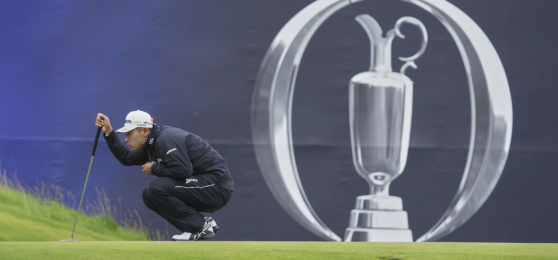 Hideki Matsuyama de Japón mira su putt en el green del hoyo 18 durante la primera ronda del Abierto Británico de golf en el Royal Portrush Golf Club, Irlanda del Norte, el jueves 17 de julio de 2025. (Foto AP/Jon Super) Hideki Matsuyama de Japón mira su putt en el green del hoyo 18 durante la primera ronda del Abierto Británico de golf en el Royal Portrush Golf Club, Irlanda del Norte, el jueves 17 de julio de 2025. (Foto AP/Jon Super)