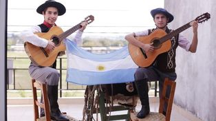 Juan Cruz y Eduardo Lolo Merlo, en el D&iacute;a de la Patria