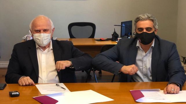 El exgobernador Miguel Lifschitz y el rector de la UNR