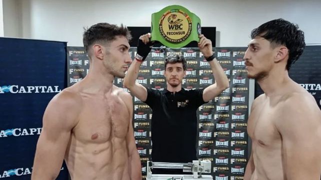 Erik ACorazado Miloc y Nahuel García se miden con las miradas. Este viernes repartirán puños en el club Banco. Gran cita del boxeo en Rosario.