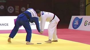 Descalifican a un judoca al caérsele el teléfono en combate
