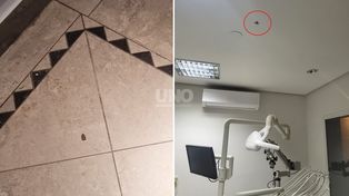 Una ojiva de 9 milímetros perforó el techo de una clínica odontológica en barrio Mariano Comas