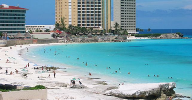 Vacaciones gratis en Canc&uacute;n para turistas que contrajeron la gripe porcina