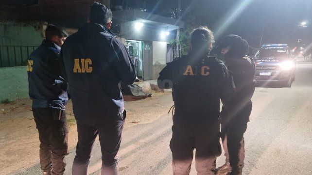 Agentes de la Agencia de Investigación Criminal