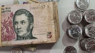Redondeo y caramelos, los comercios afrontan la falta de monedas