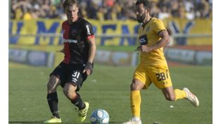 Allá lejos y hace tiempo. Cacciabue y Gamba, en el último clásico jugado, en septiembre de 2019 en el Gigante. Hace mucho.