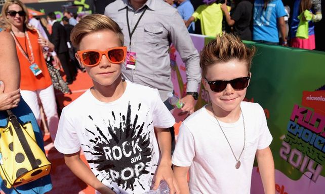 Beckham y dos de sus hijos, bañados en oro