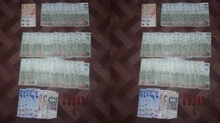 Parte del dinero recuperado por la policía.&nbsp;