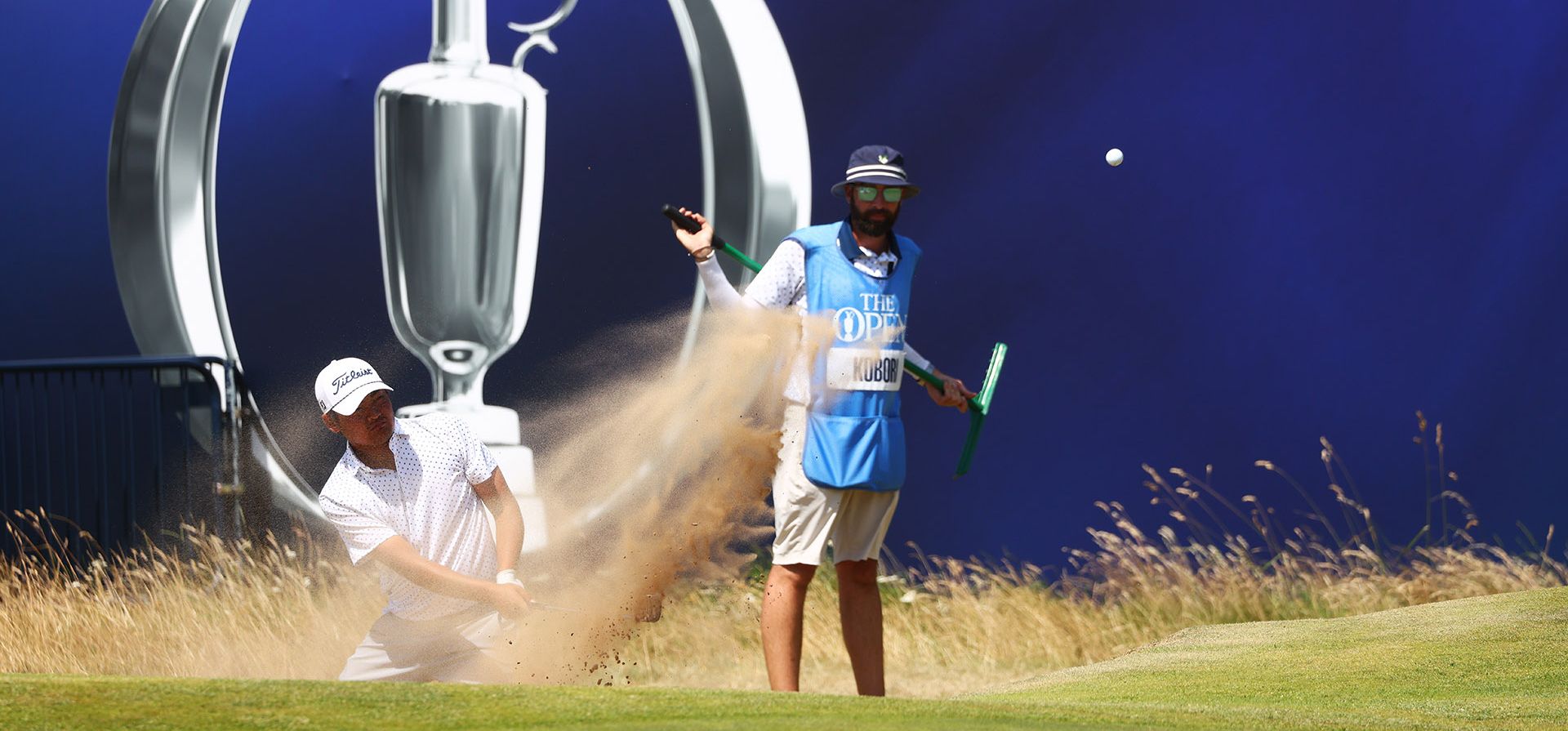 El neozelandés Kazuma Kobori sale del búnker durante una ronda de práctica en el Campeonato Británico Abierto de Golf en Royal Birkdale, Southport, Inglaterra, el lunes 13 de julio de 2026. (Foto AP/Peter Morrison) El neozelandés Kazuma Kobori sale del búnker durante una ronda de práctica en el Campeonato Británico Abierto de Golf en Royal Birkdale, Southport, Inglaterra, el lunes 13 de julio de 2026. (Foto AP/Peter Morrison)