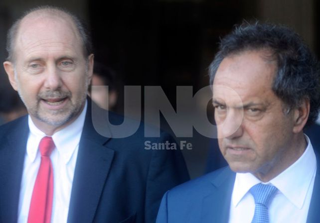 Aval. Es la segunda llegada de Scioli (derecha) a la ciudad.