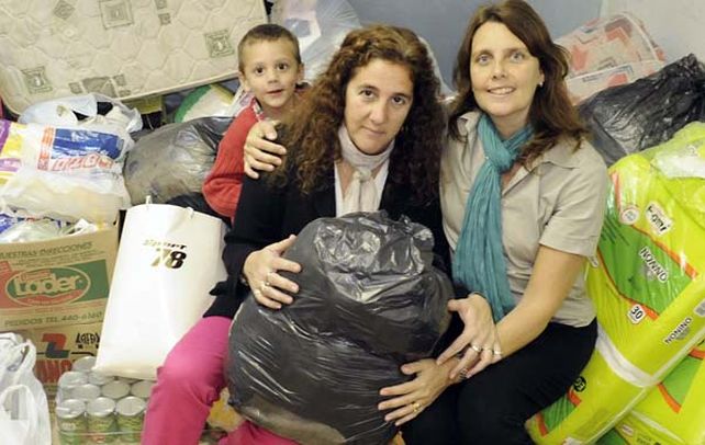 Puro empuje. Jorgelina (izquierda) junto a su hijo Patricio y su amiga Mina