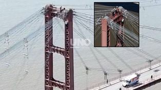 Rescataron a un hombre que había subido a la cima del Puente Colgante tras casi una hora de operativo