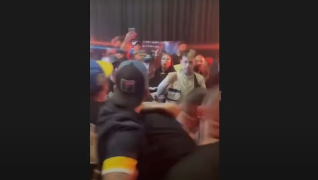 Caos. L-Gante es contenido por los custodios en el momento en que casi se va a las manos con el representante del youtuber Cabrera. (Imagen de video)