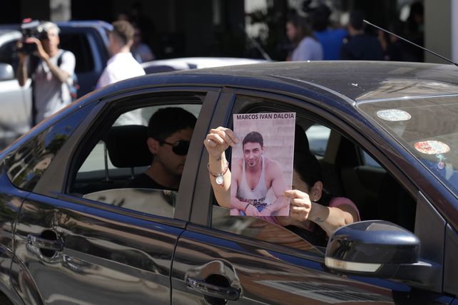 Una foto del chofer Marcos Daloia el día se su sepultura, víctima en la saga de cuatro crímenes de trabajadores. 