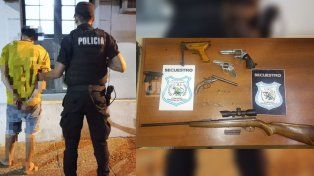 El detenido junto a las armas secuestradas en su casa