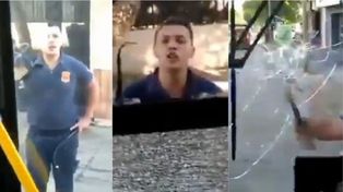 Video: un bombero fuera de sí atacó violentamente un colectivo de pasajeros
