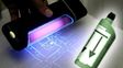 Desarrollan una tinta invisible multicolor que solamente es visible bajo luz ultravioleta