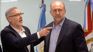 El ex ministro de Seguridad Marcelo Saín y el gobernador Omar Perotti.