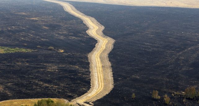 M&aacute;s de 165 mil personas trabajan para combatir los incendios forestales en Rusia