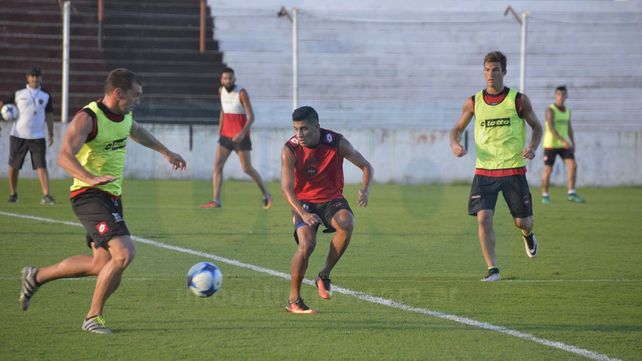 Masuero (con la pelota)