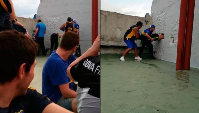 Un hincha de Boca quiso pasarse de tribuna y quedó atascado