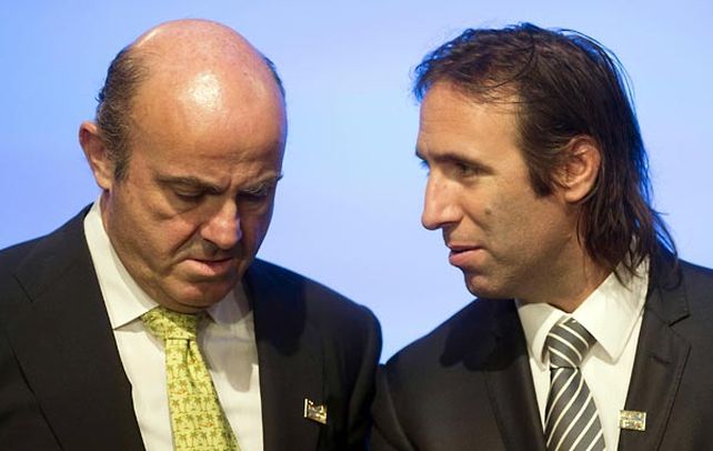 Gestiones. Lorenzino dialoga con su par español en la asamblea conjunta del FMI y Banco Mundial. ¿Hablan de Repsol?