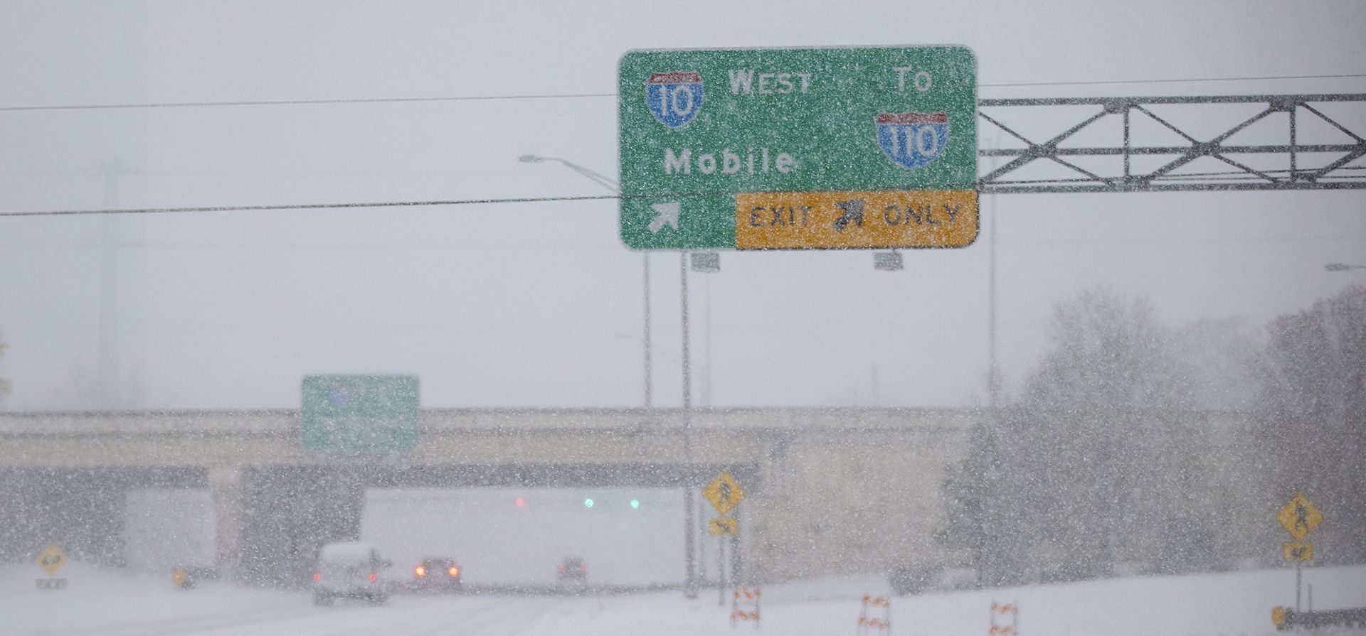 La vía de acceso a la autopista interestatal 10 está cerrada debido a una fuerte nevada el martes 21 de enero de 2025 en Pensacola, Florida. (Luis Santana/Tampa Bay Times vía AP) La vía de acceso a la autopista interestatal 10 está cerrada debido a una fuerte nevada el martes 21 de enero de 2025 en Pensacola, Florida. (Luis Santana/Tampa Bay Times vía AP)