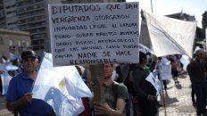 Uno de los carteles de la marcha del lunes en el Monumento. Uno de los carteles de la marcha del lunes en el Monumento.