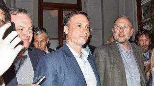 Michlig, Enrico y Corach, parte de los equipos que participaron de la primera reunión de transición.