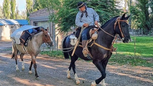 Junto a sus caballos