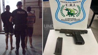 Los detenidso y el arma secuestrada