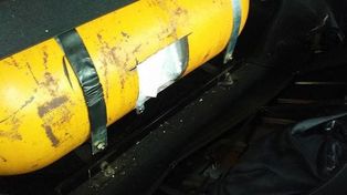 Intentó entrar al país con 40 Iphone dentro de un tanque de gas