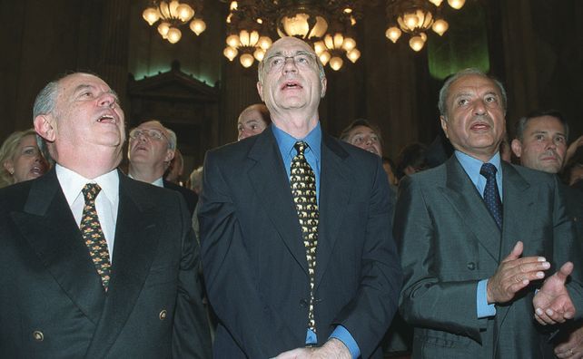 Corach, Bauzá y Menem. 