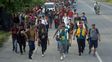 Centroamericanos luego de cruzar la frontera entre Guatemala&nbsp; y México en Ciudad Hidalgo.