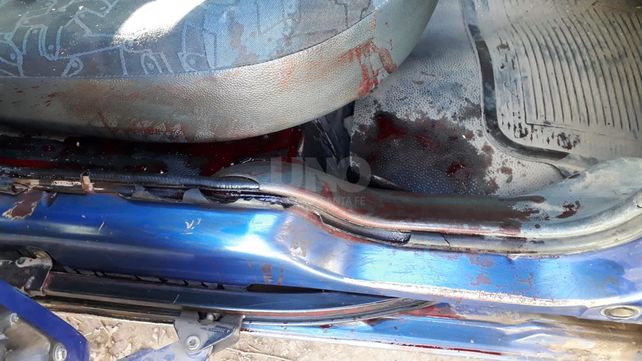Así quedo el interior del auto tras el ataque a tiros.&nbsp;