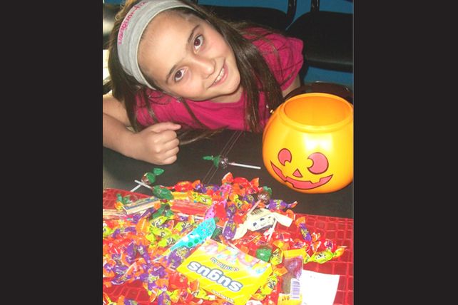 Los ganadores del concurso Mini Hallowen, felices con sus calabazas