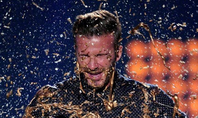 Beckham y dos de sus hijos, bañados en oro