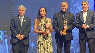 Messi y la atleta Belén Casetta compartieron el Olimpia de Oro