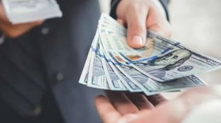 Cómo comprar dólares sin el recargo del 30%