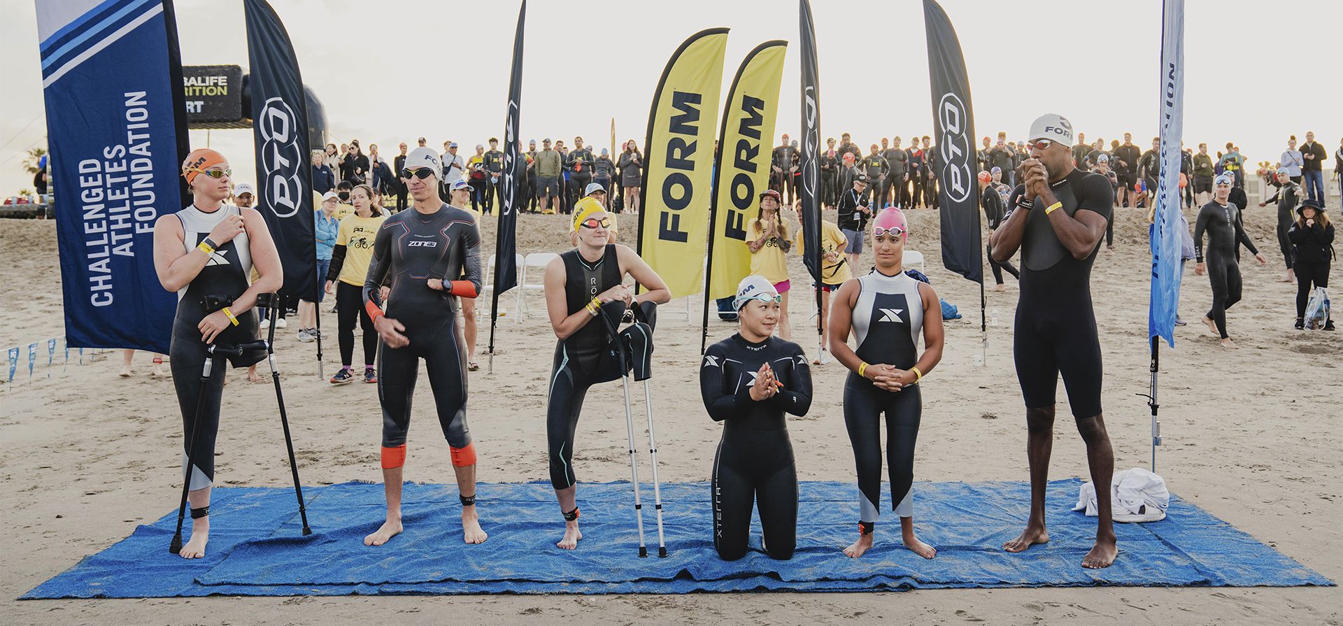 Los atletas Ahalya Lettenberger, Allysa Seely, Chris Hammer, Emily Gray, Haven Shepard y Jamal Hill se preparan para participar en el Herbalife 24 Triathlon LA PTO Pro Am el domingo 15 de mayo de 2022 en Los Ángeles . Algunos de los mejores triatletas del mundo corrieron con miembros de la comunidad Challenged Athlete Foundation en un evento Pro-Am que hizo historia.