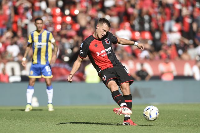 Luca Regiardo y de fondo Ángel Di María